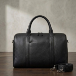 Darkside Pebbled Black Leather Duffel Bag with Braided Strap and Silver Hardware