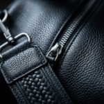 Darkside Pebbled Black Leather Duffel Bag with Braided Strap and Silver Hardware