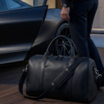 Darkside Pebbled Black Leather Duffel Bag with Braided Strap and Silver Hardware