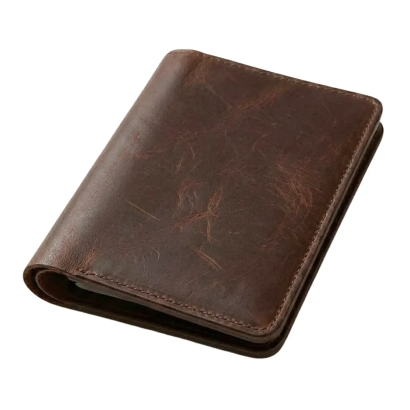 Best leather passport holder for men USA — distressed dark brown full-grain leather travel folio Rove Leather