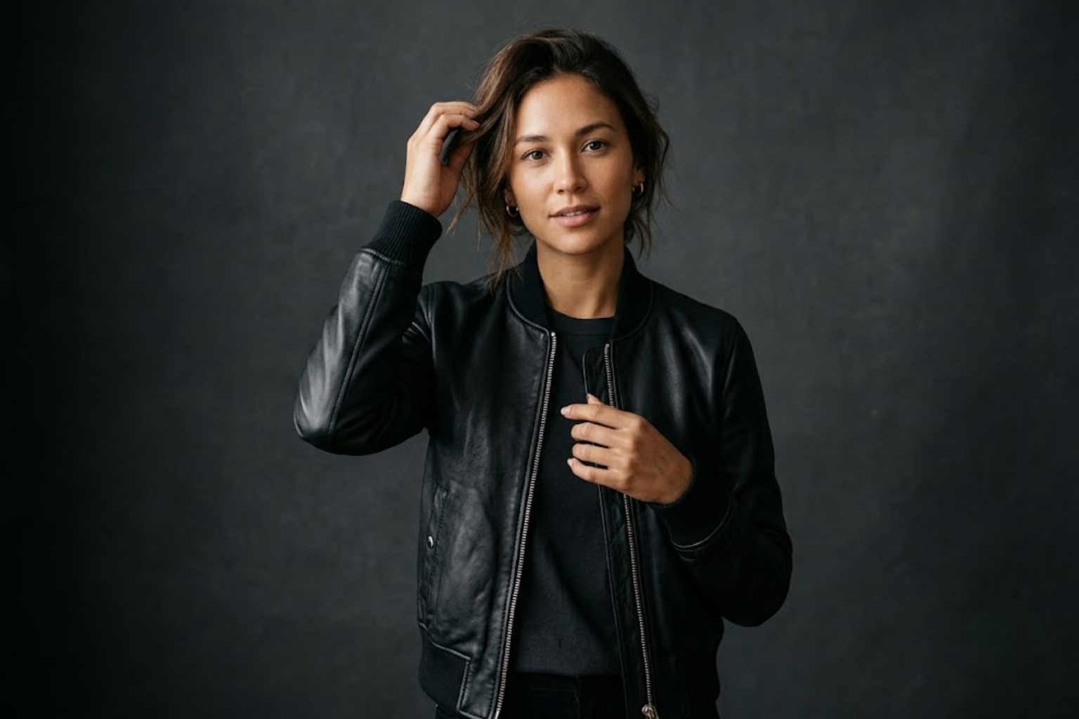 woman wearing leather bomber jacket by rove leather